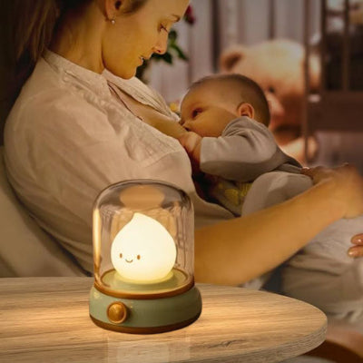veilleuse_goutte_d_eau_avec_maman_qui_allaite_bebe_derriere