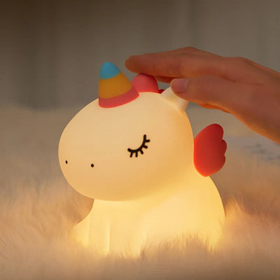 veilleuse pour bebe licorne sur tapis poil